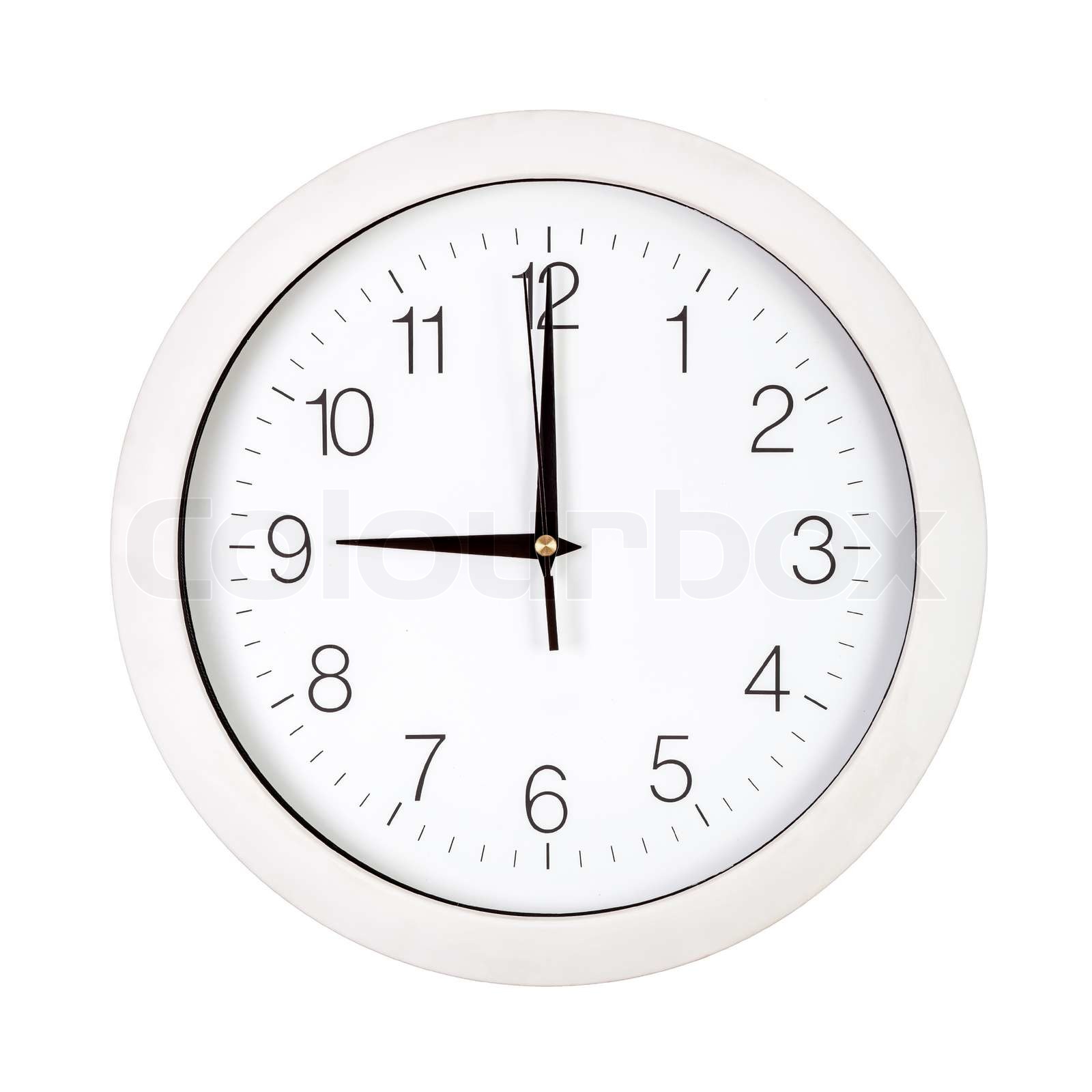 Clock face showing nine o'clock Stock image Colourbox